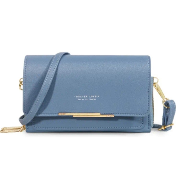 Handbags - BNWT Crossbody blue clutch purse. Sooo cute I bought myself one & one 2 sell